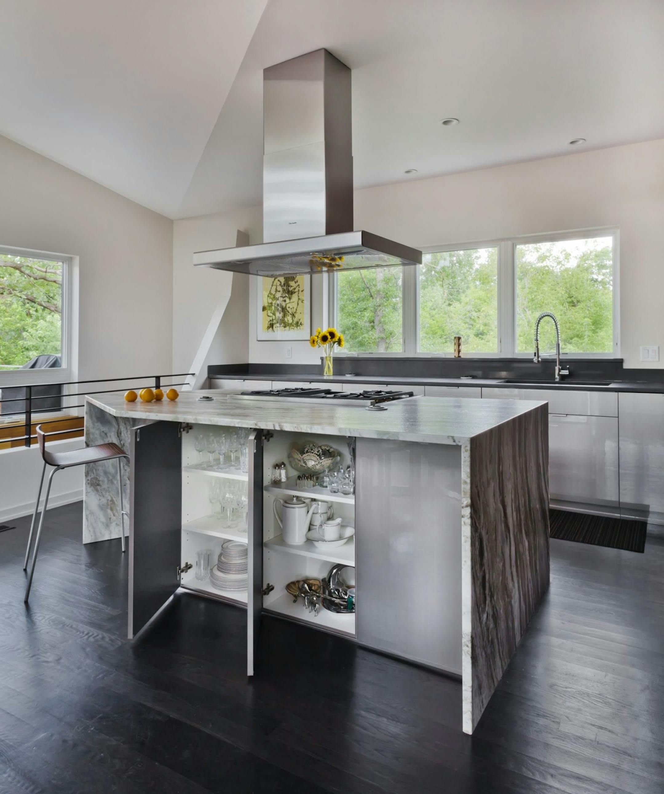 Home of he Month: RoehrSchmitt Architecture translated the best features of a family's downtown loft into a new modern home . Credit Gilbertson Photography