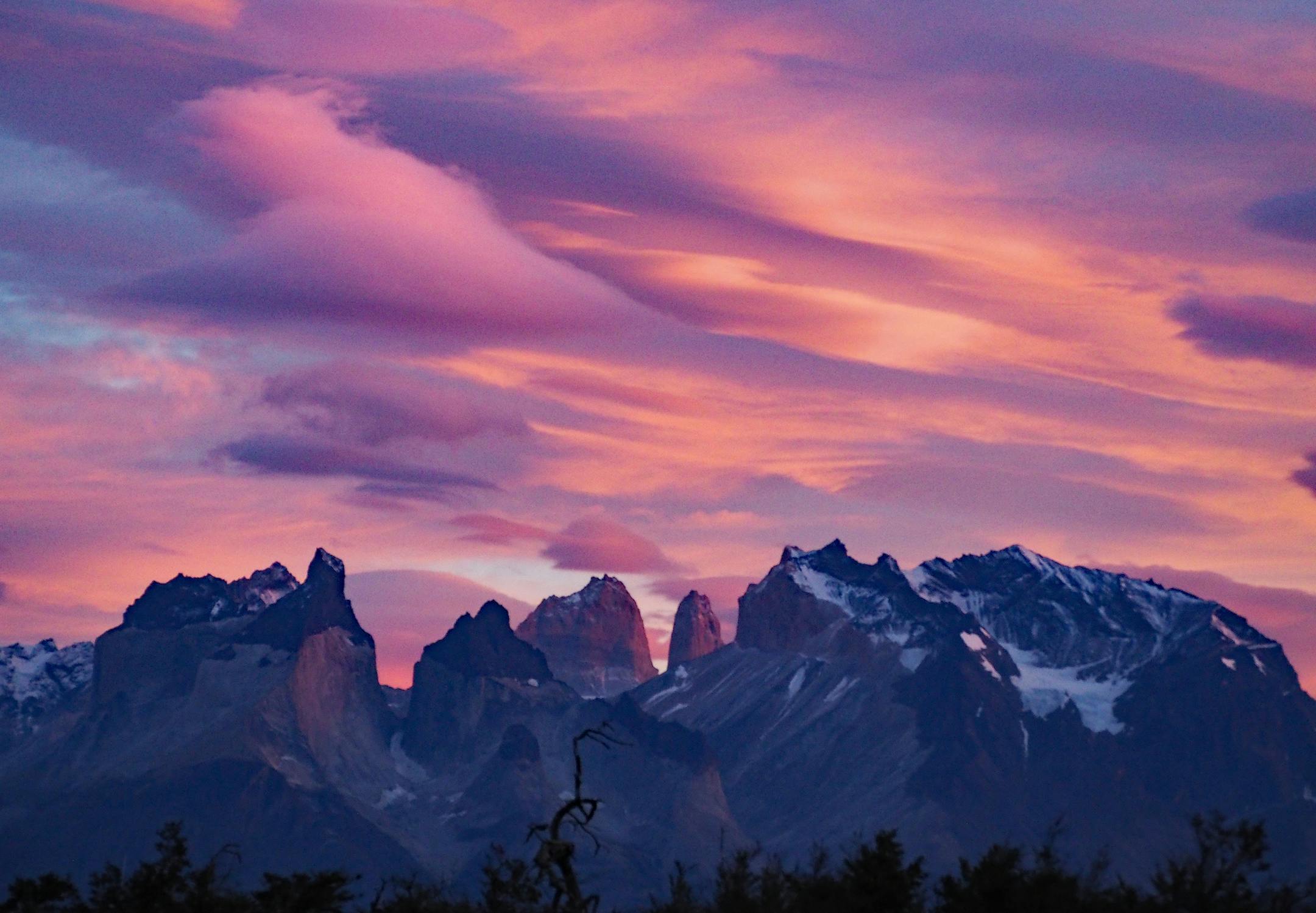 Randy Evans Edina, MN 952-486-0794 This photo was taken from the Hotel Rio Serrano, overlooking the southern tiers of the Andes mountains, and Torres del Paine National park in southern Chile. The park is in a region known as Patagonia, which includes parts of Chile and Argentina. Torres del Paine means towers of blue, and three immense rock towers in these mountains give the park its name. I used an Olympus OM-D E-M10 Mark II mirrorless camera with a 40-15mm zoom lens. This was one of the most