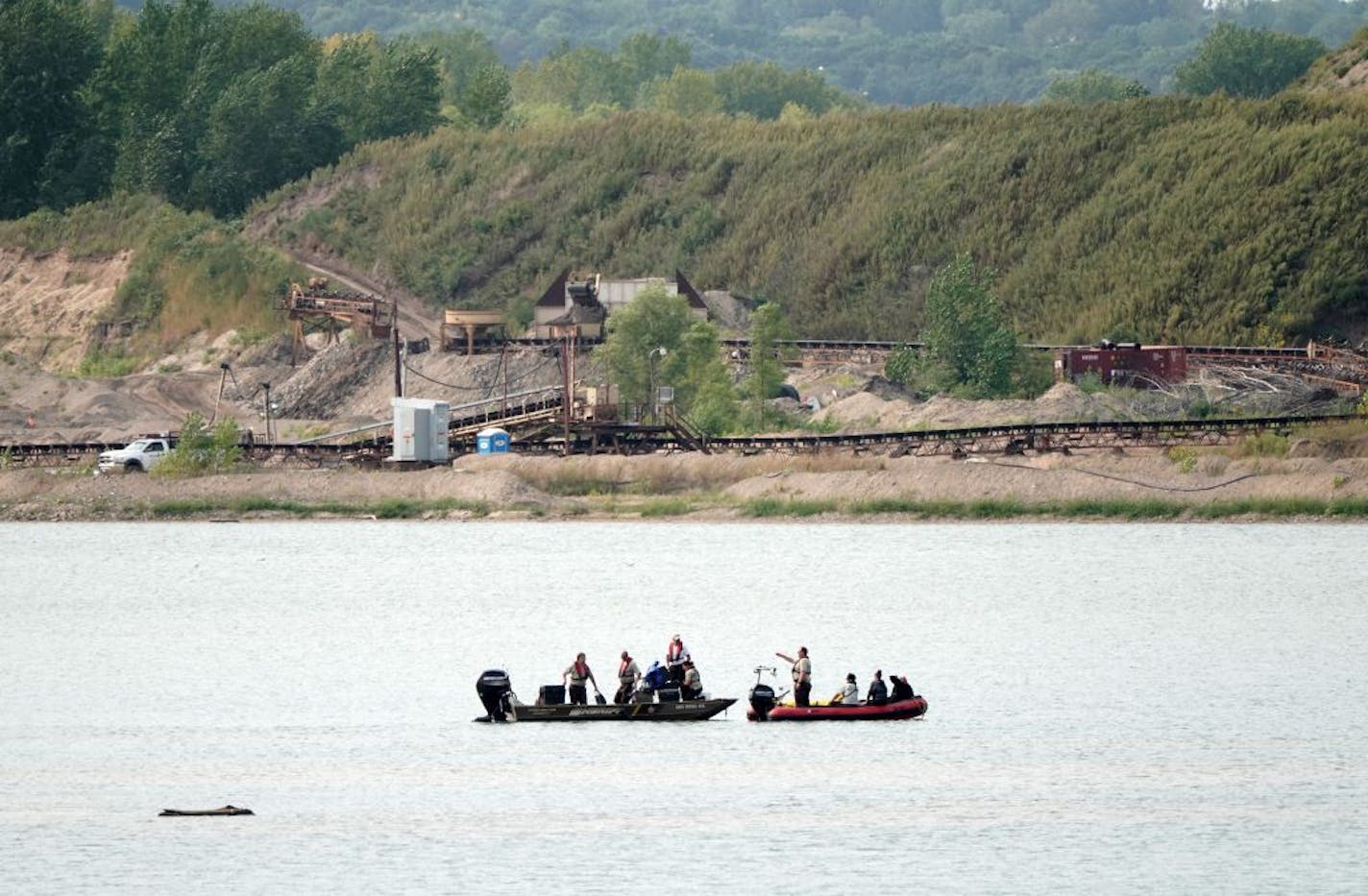 Washington County Water Recovery personnel searched with sonar on Monday, Sept. 14, for an airplane that went down in a quart near Grey Cloud Island between Cottage Grove and St. Paul Park.