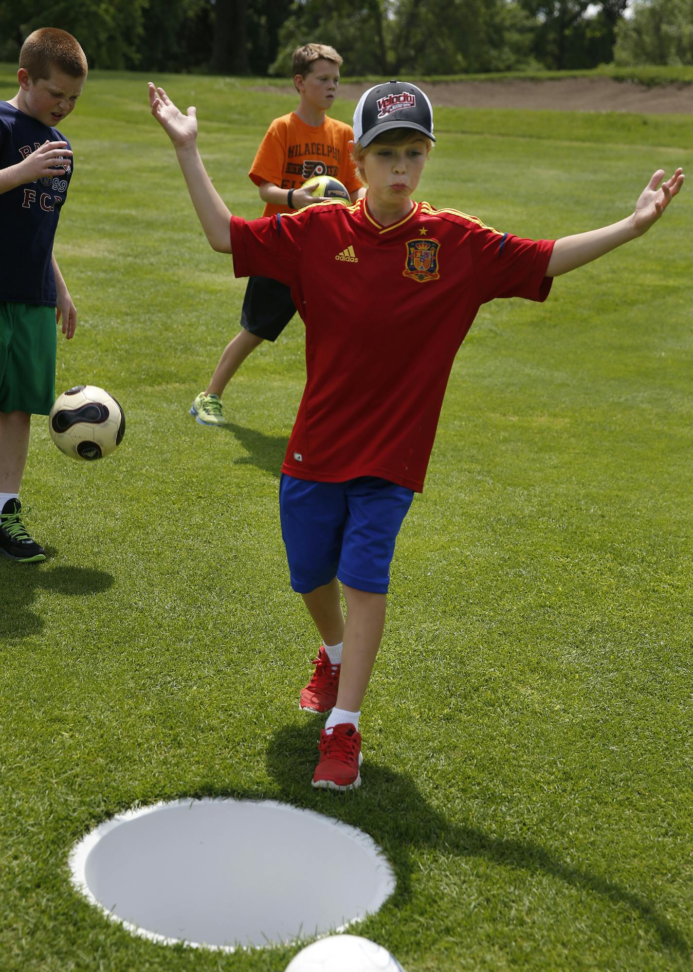 At the Hyland Golf Course in Bloomington on July 16, 2014, footgolf enthusiast Andrew Hulbert,10, was a little annoyed by his "putt" which did not go in the hole.]Richard Tsong-Taatarii/rtsong-taatarii@startribune.com