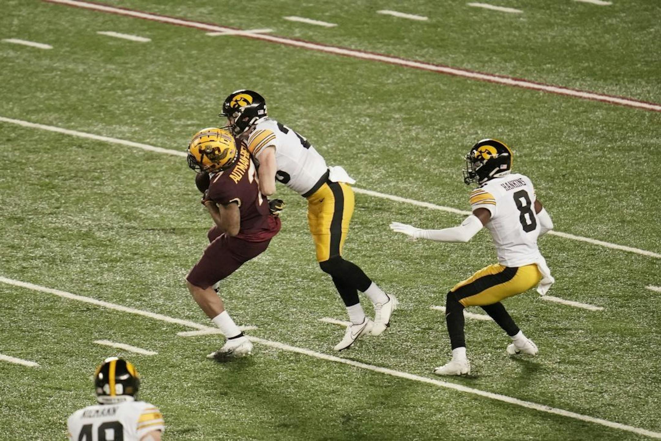 Iowa Hawkeyes defensive back Jack Koerner (28) broke up a pass intended for Minnesota Gophers wide receiver Chris Autman-Bell (7) in the second quarter. It was called as a targeting penalty but overturned.