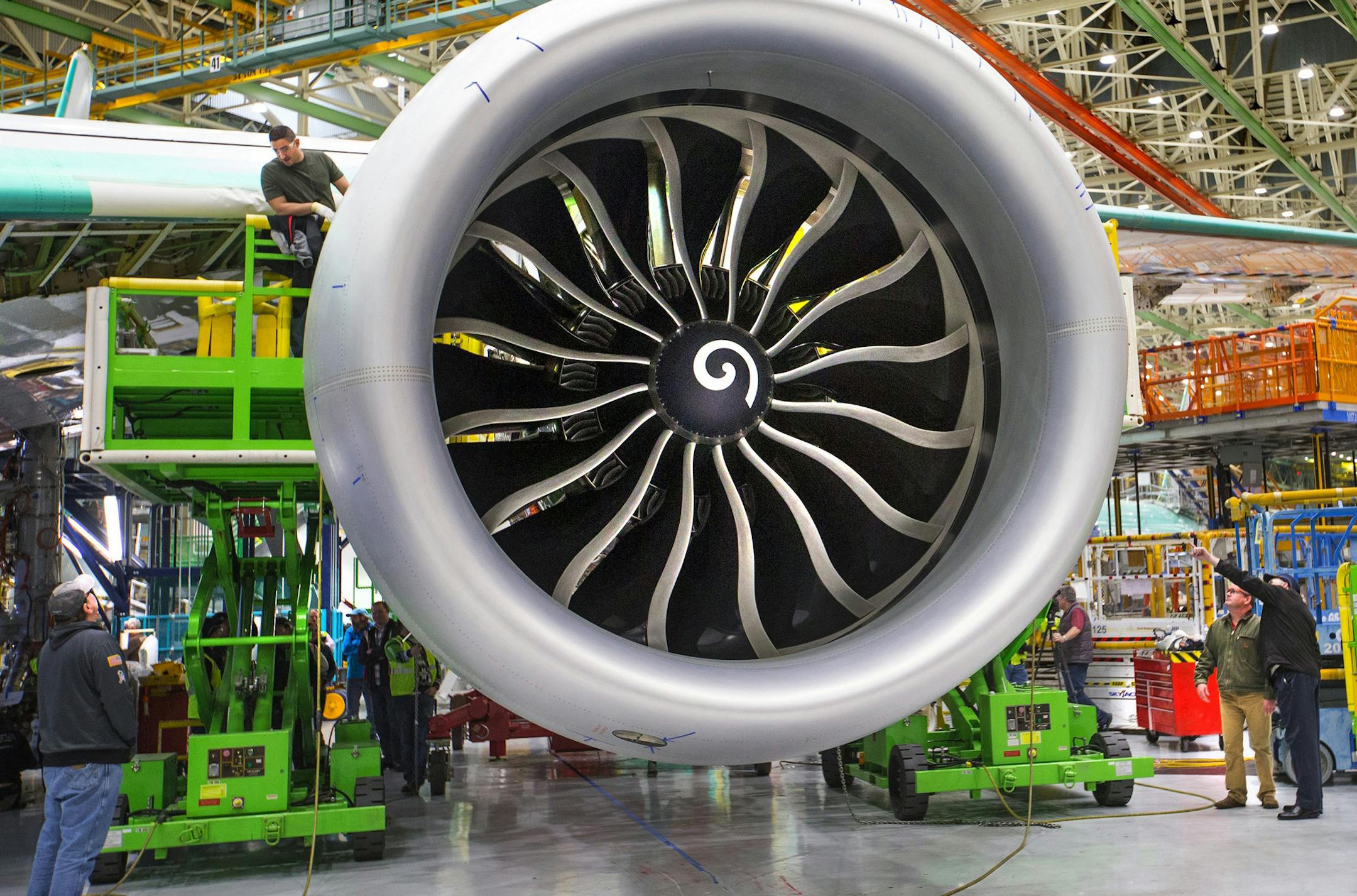 The Boeing 777X has the biggest jet engines ever made. A GE9X is seen here inside the Everett assembly plant. A problem with the engine will delay the first flight of the new plane. (Mike Siegel/The Seattle Times/TNS)