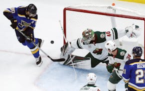 St. Louis Blues' Alexander Steen (20) is unable to score past Minnesota Wild goaltender Devan Dubnyk (40) during the first period of an NHL hockey gam
