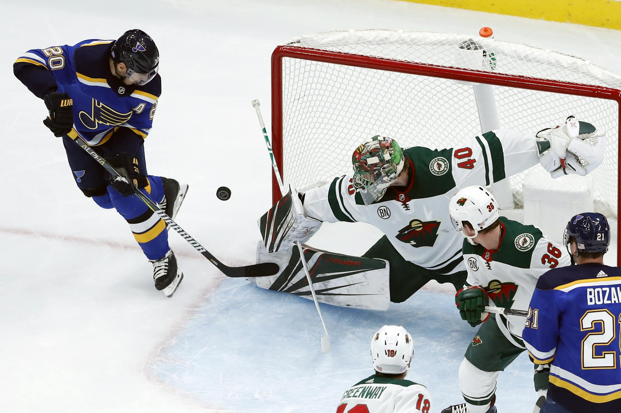 St. Louis Blues' Alexander Steen (20) is unable to score past Minnesota Wild goaltender Devan Dubnyk (40) during the first period of an NHL hockey game Sunday, Nov. 11, 2018, in St. Louis. (AP Photo/Jeff Roberson)