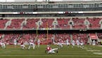 Arkansas kick returner De'Vion Warren tries to get a handle on the kick off during the first half of an NCAA college football game Saturday, Nov. 18, 
