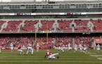 Arkansas kick returner De'Vion Warren tries to get a handle on the kick off during the first half of an NCAA college football game Saturday, Nov. 18, 