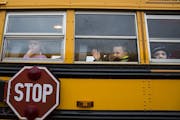 Students sit on the bus at the end of the school day at Eastview Elementary School in Lakeville on Wednesday, November 11, 2015.