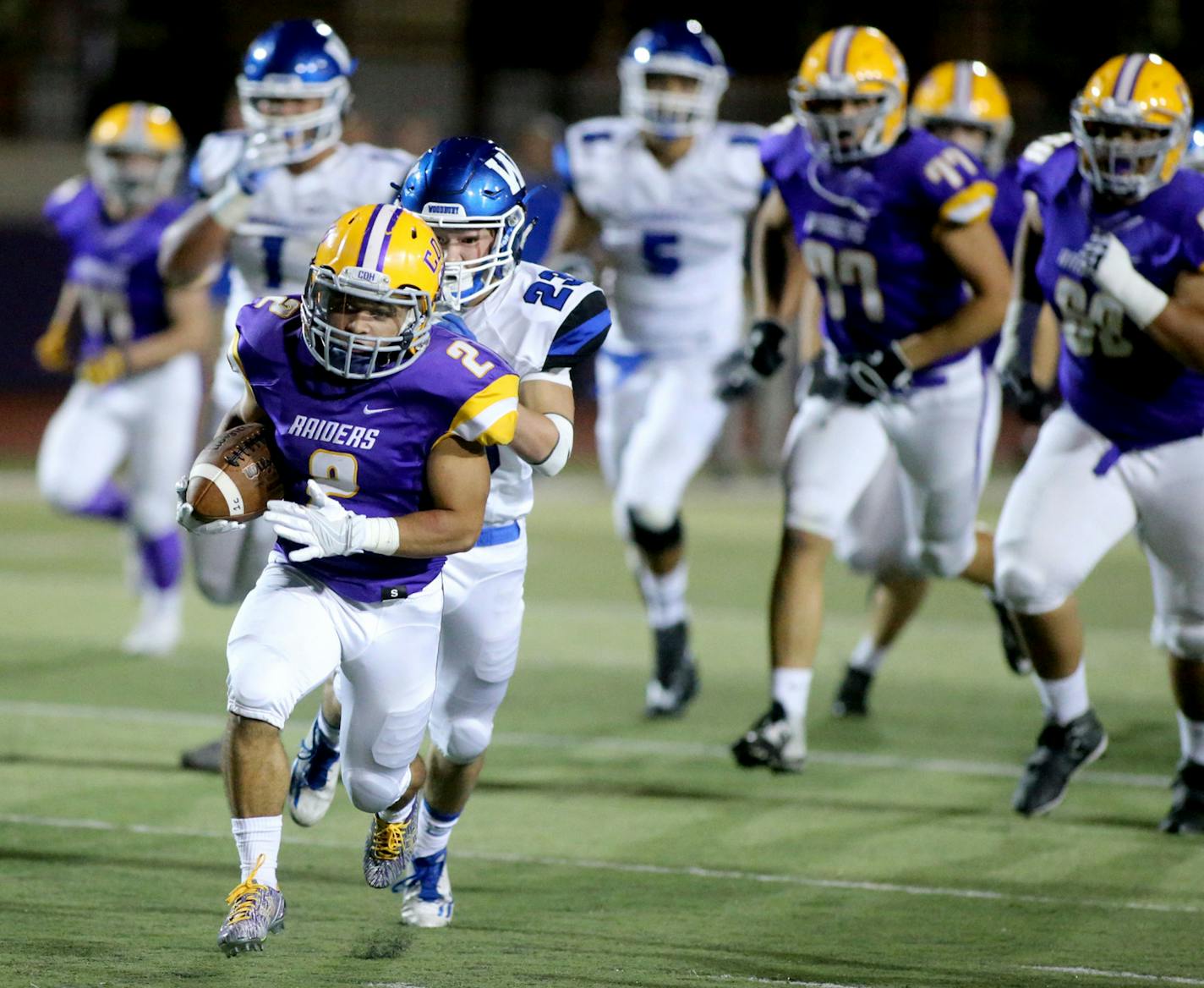 Cretin-Derham Hall runback Marquez Thompson (2) blows by Woodbury High defenders en route to a long fourth quarter touchdown run Friday, Sept. 9, 2016, at St. Thomas University in St. Paul, MN. Cretin-Derham Hall beat Woodbury 22-12.](DAVID JOLES/STARTRIBUNE)djoles@startribune.com Woodbury vs. Cretin-Derham Hall Friday, Sept. 9, 2016, at St. Thomas University in St. Paul, MN.