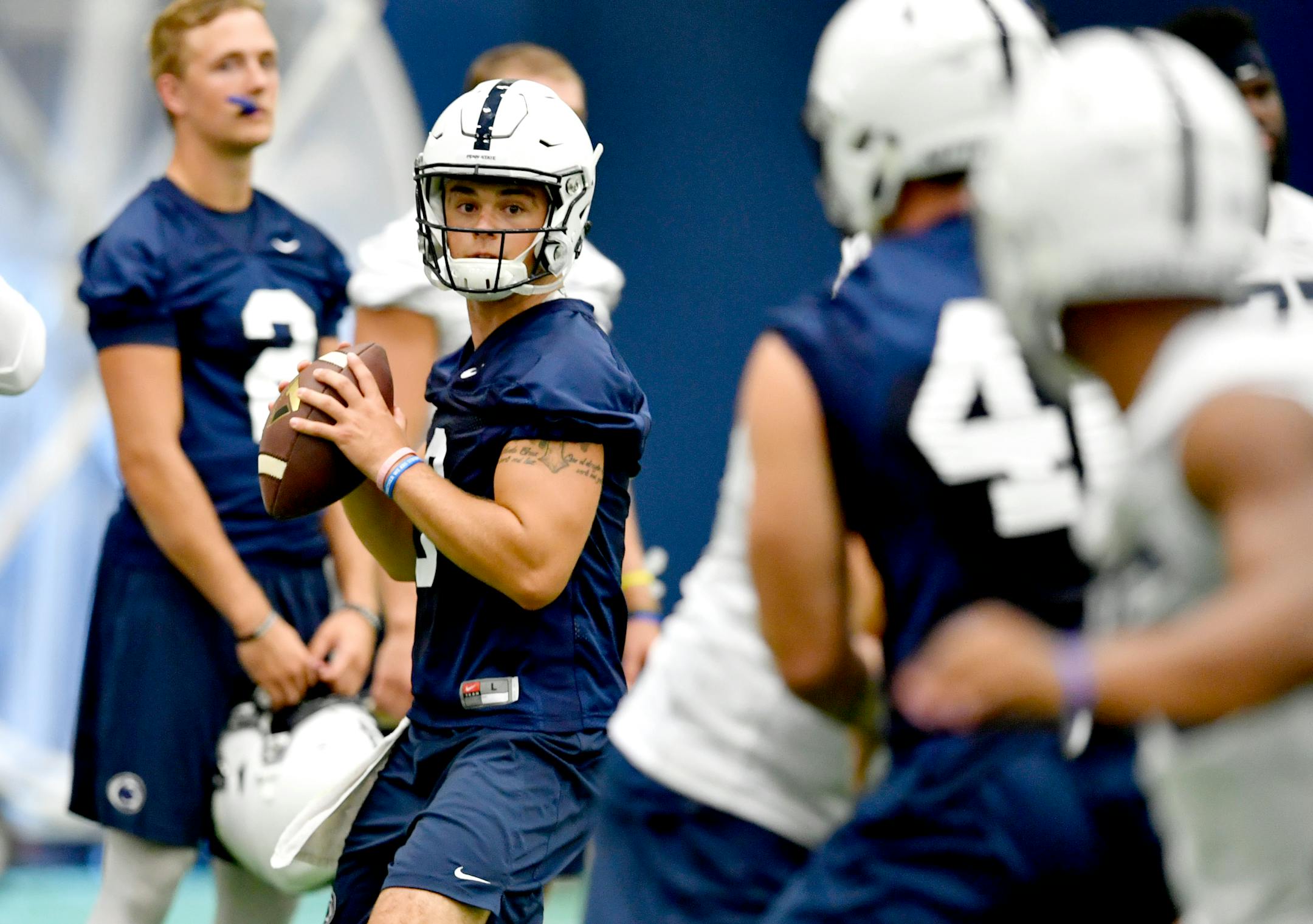 Penn State quarterback Trace McSorley looks for a teammate to pass to during the NCAA college football team's practice, Wednesday, Aug. 24, 2016, in State College, Pa. McSorley will start at quarterback when the Nittany Lions open against Kent State on Sept. 3. Coach James Franklin settled on the sophomore after McSorley battled redshirt freshman Tommy Stevens for the job through the spring and summer. (Abby Drey/Centre Daily Times via AP)