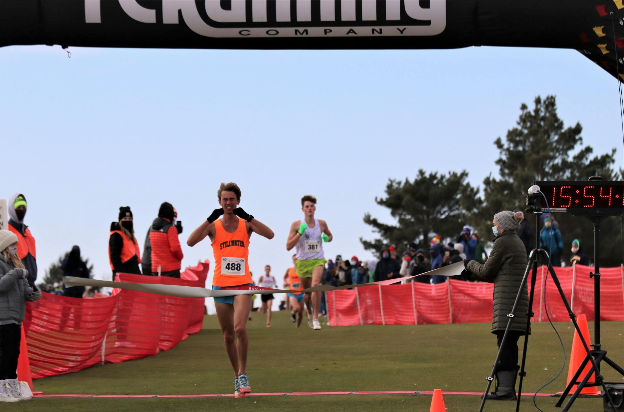 Stillwater's Ethan Vargas crossed the finish line at the TC Running Company cross-country race on Oct. 30.