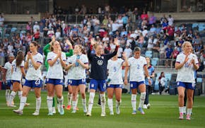 United States players wave to the crowd after their 3-0 victory over China on Saturday at Allianz Field.