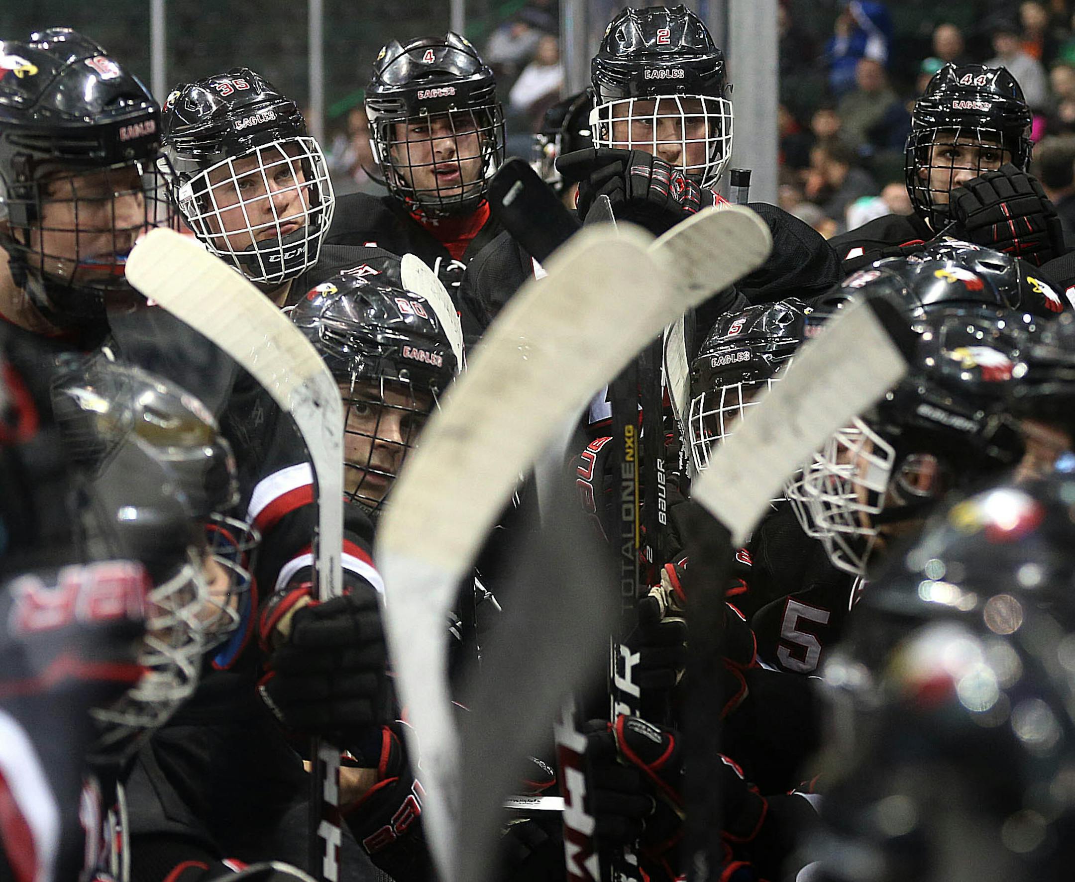 Eden Prairie players listened to strategy from their head coach, Lee Smith, during a break in the action in the first period. ] JIM GEHRZ ‚Ä¢ jgehrz @startribune.com / St. Paul, MN / March 7, 2014 / 6:00 PM BACKGROUND INFORMATION: Lakeville North High School played Eden Prairie in the semifinals of the 2014 State Class 2A Hockey Tournament at the Xcel Energy Center.
