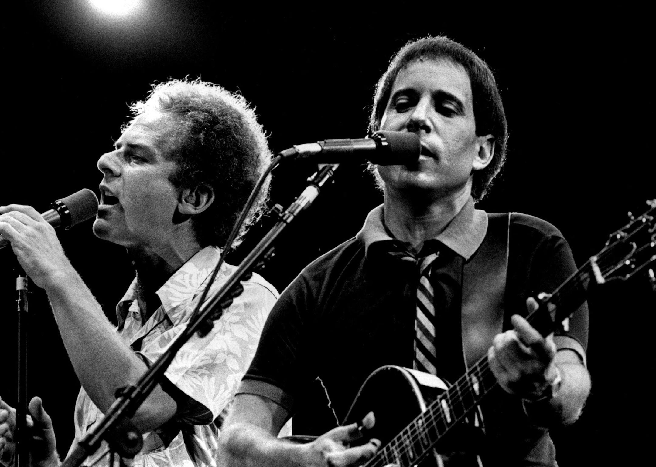 July 29, 1983 Art Garfunkel, left, and Paul Simon performed old songs and new for thousands of fans Thursday night at Parade Stadium. July 28, 1983 August 1983 David Brewster, Minneapolis Star Tribune