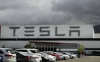 This photo shows the Tesla plant Tuesday, May 12, 2020, in Fremont, Calif. Tesla CEO Elon Musk has emerged as a champion of defying stay-home orders i