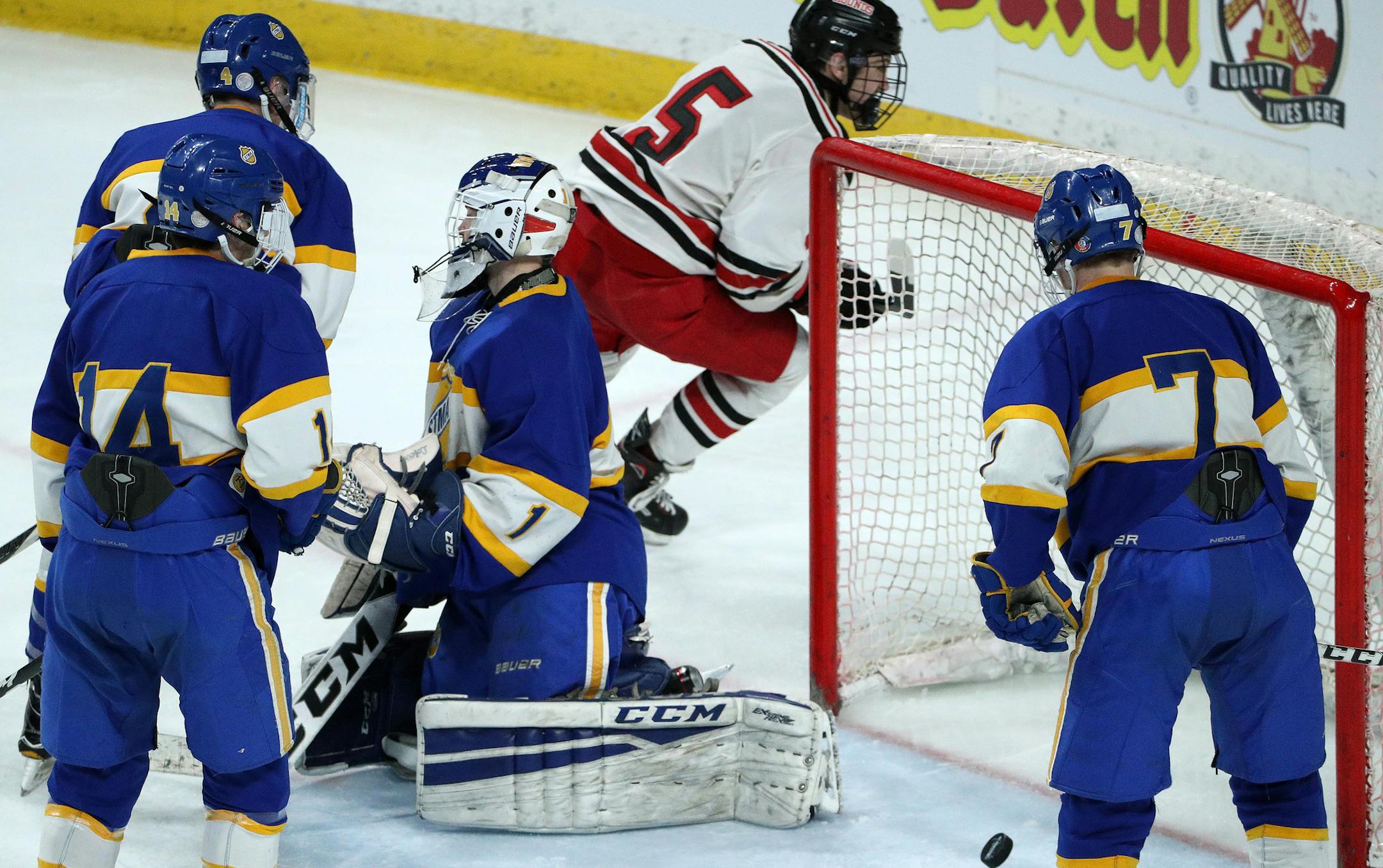 Duluth East High School forward Garrett Worth (5) celebrated after scoring on St. Michael-Albertville High School goaltender Justin Damon (1) in the second period. ] ANTHONY SOUFFLE &#xef; anthony.souffle@startribune.com Duluth East High School played St. Michael-Albertville High School in an Class 2A boys' hockey quarterfinals game Thursday, March 8, 2018 at the Xcel Energy Center in St. Paul, Minn.