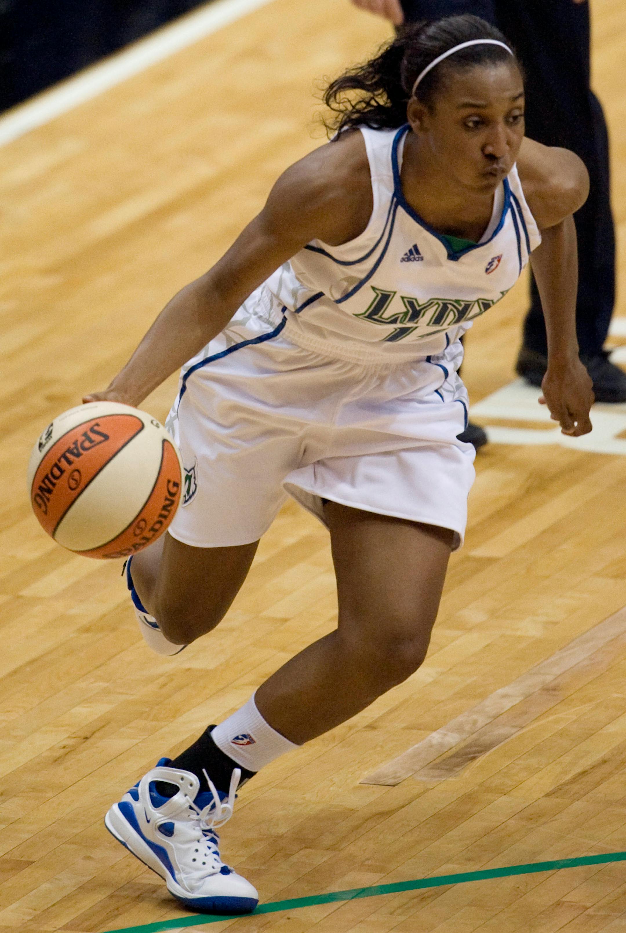 Minnesota Lynx guard Candice Wiggins (11) drives to the basket during a WNBA preseason basketball game against the Connecticut Sun, on Thursday, May 1, 2008 at the Target Center in Minneapolis.