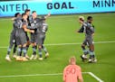 Teammates celebrated a goal by Minnesota United midfielder Robin Lod (17), second from left, late in the first half during a game this season.