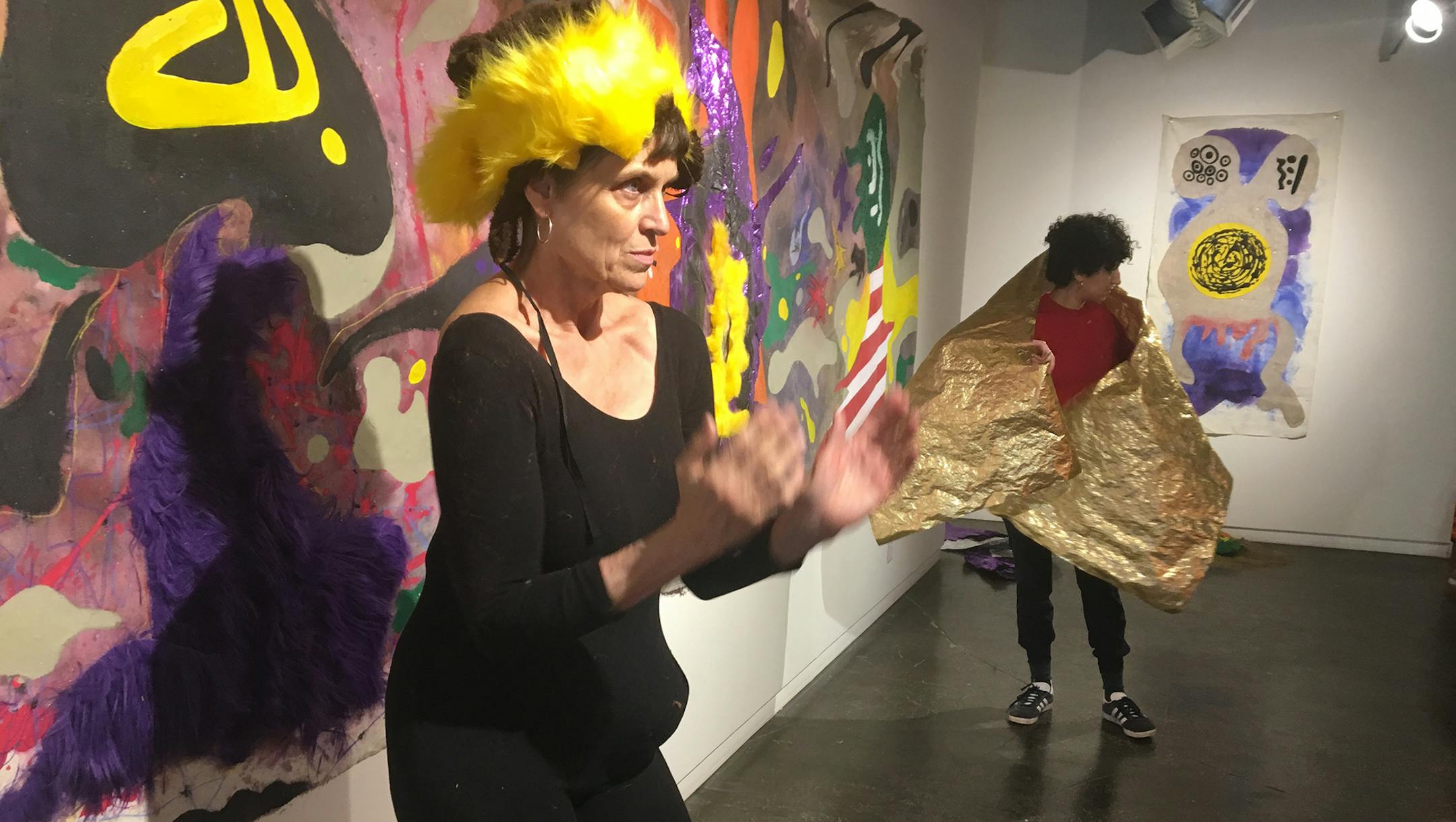 Provided by Soo Visual Arts Center
This is an image from the rehearsal of the first iteration of Collab. The painting in the back ground is Two Tribes (A Lovely War) by Christopher Harrison. Dancers Judith Howard on the left and on the right Marggie Ogas. choreographed by Laurie Van Wieren.
