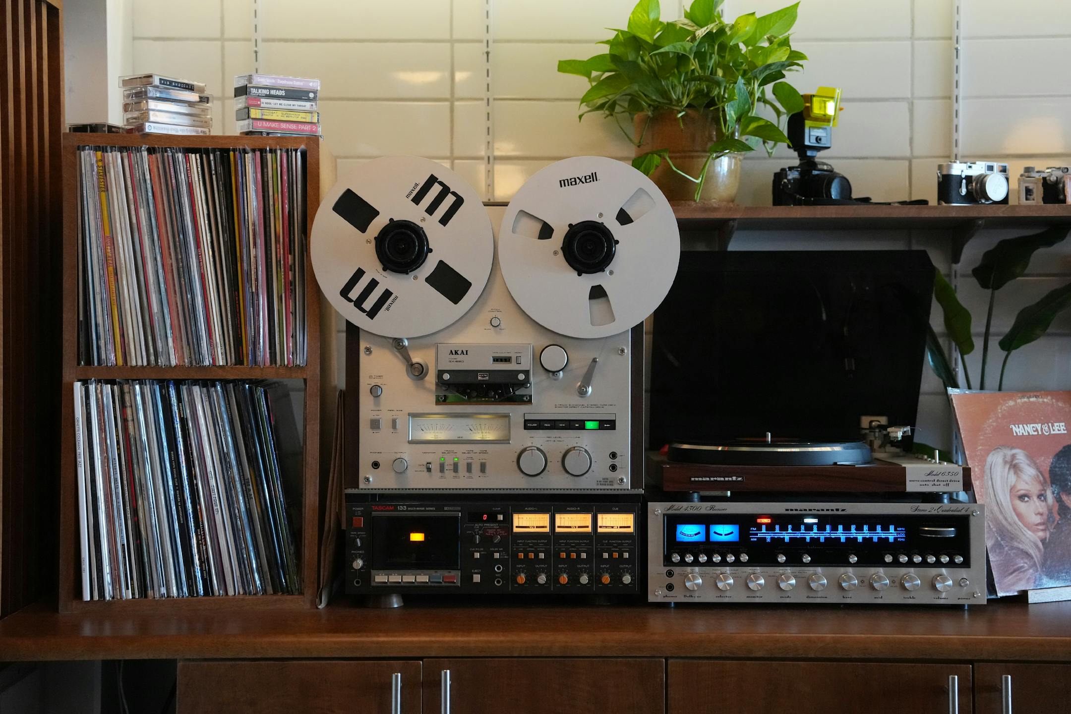 A record player plays music from behind the bar at Disco Death Records.