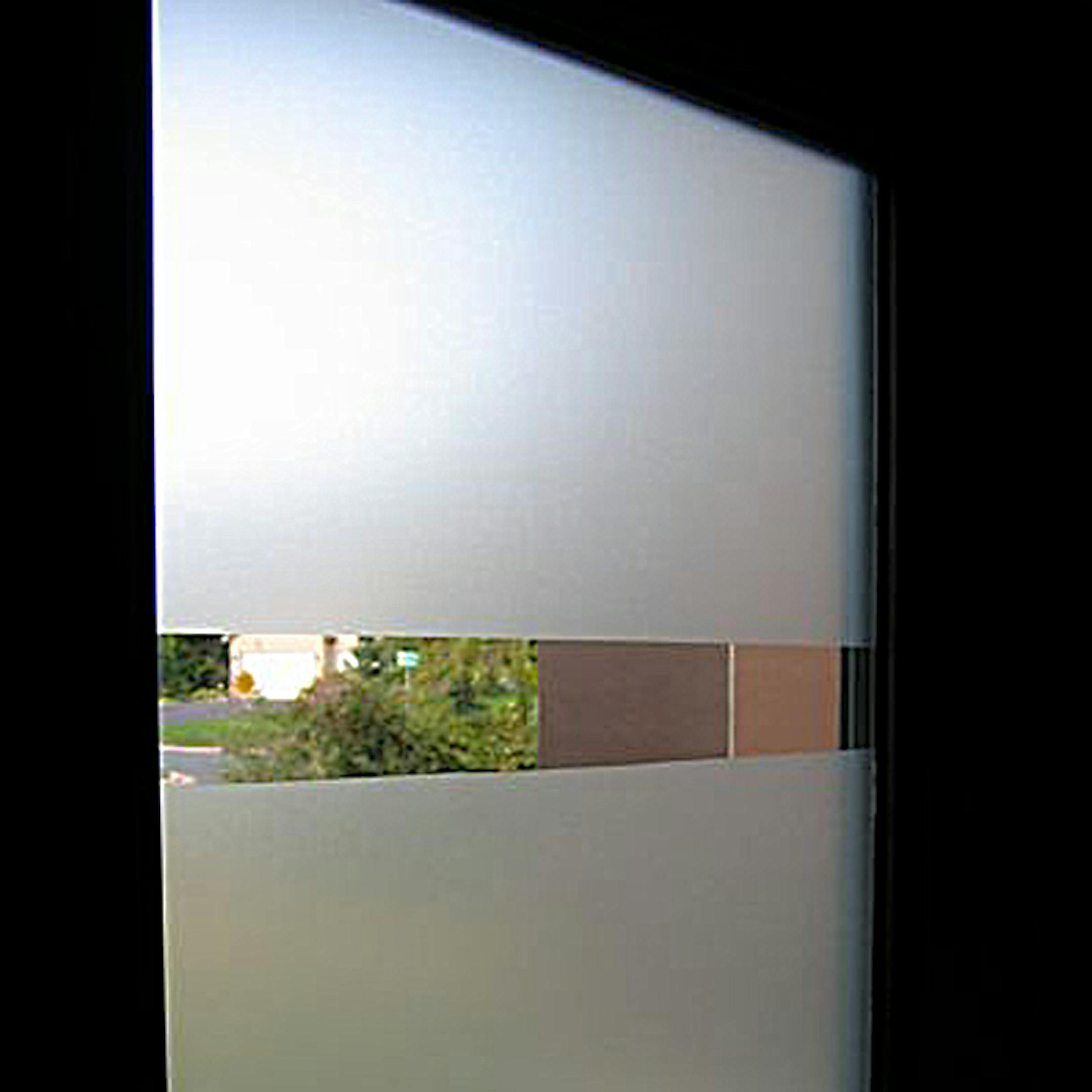 Strips of window film gave needed privacy, but left a view to the outside.