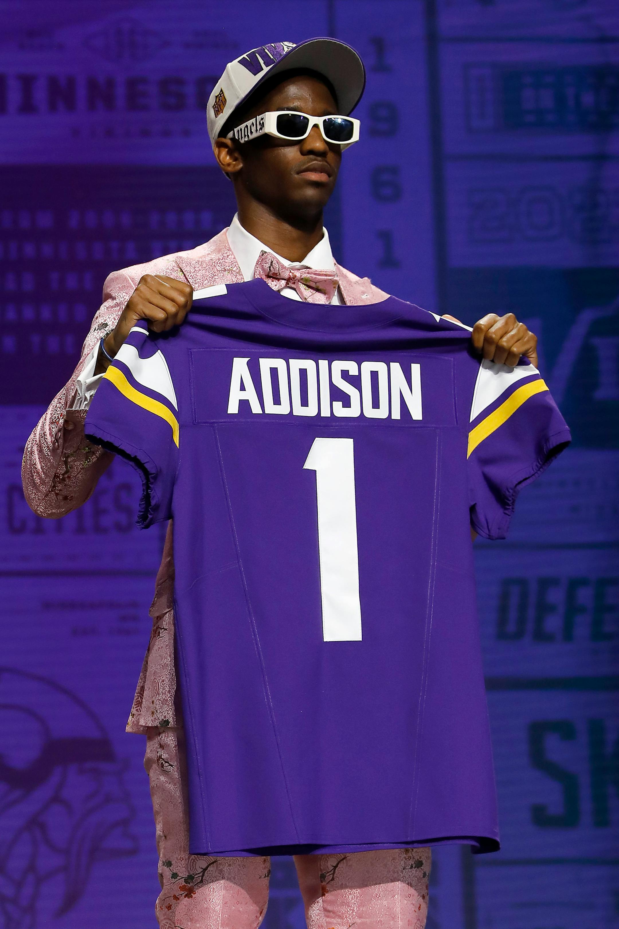 Jordan Addison poses after being selected 23rd overall by the Minnesota Vikings during the first round of the NFL Draft at Union Station on Thursday in Kansas City, Missouri.