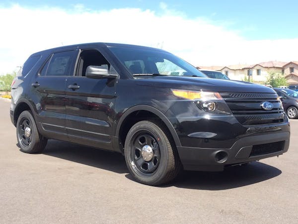 Police say someone is going around in Richfield in a model of SUV like this one and posing as an officer.