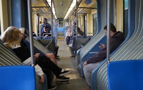 Riders travel between the Metro Transit Terminal 1 Lindbergh station and Terminal 2 Humphrey station Wednesday at MSP Airport.