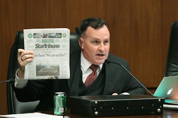 Representative John Lesch made a point using the Star Tribune against a bill that Representative Nick Zerwas introduced regarding protests, Tuesday, J