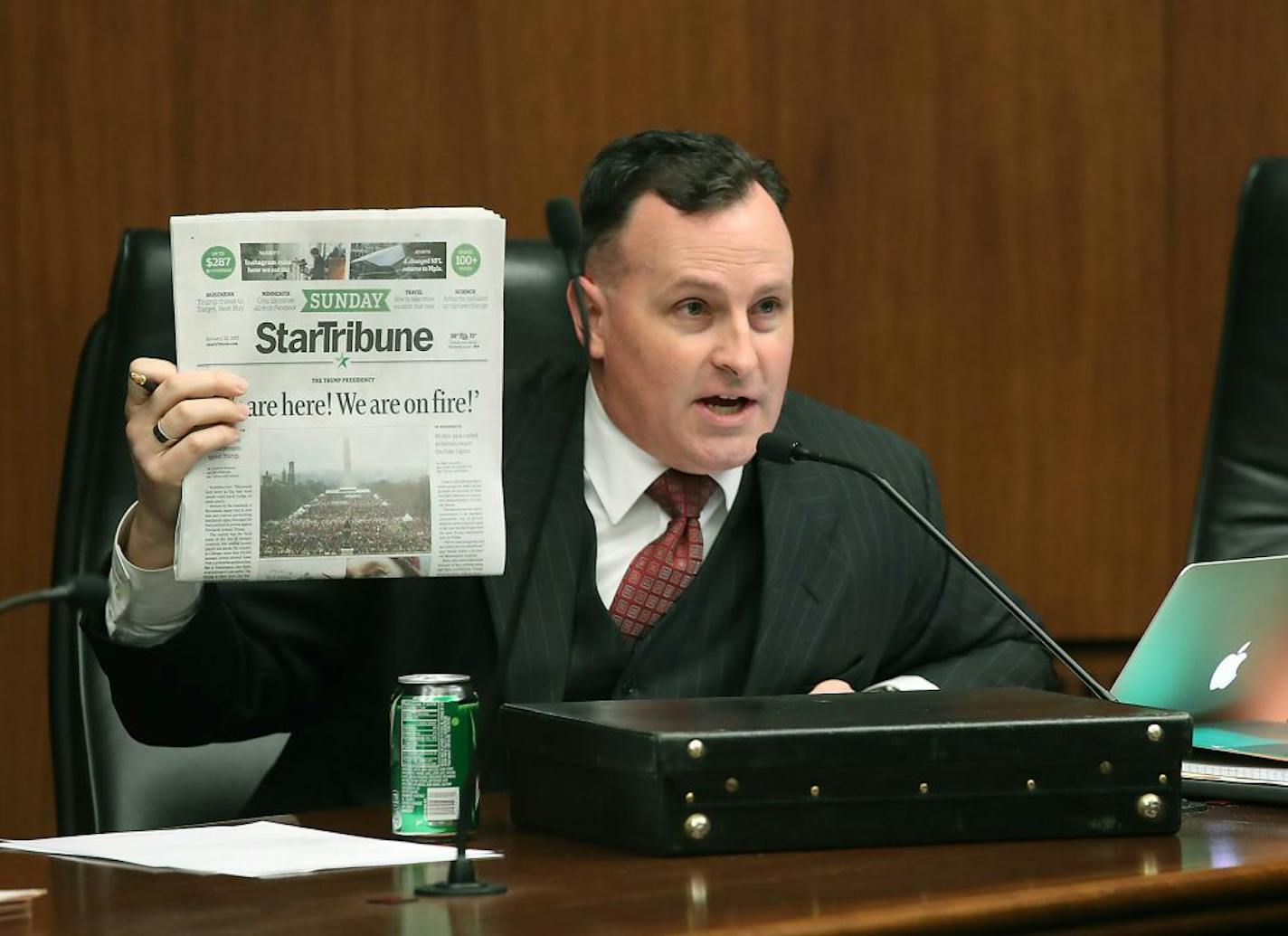 Representative John Lesch made a point using the Star Tribune against a bill that Representative Nick Zerwas introduced regarding protests, Tuesday, January 24, 2017 at the State Office Building in St. Paul, MN.