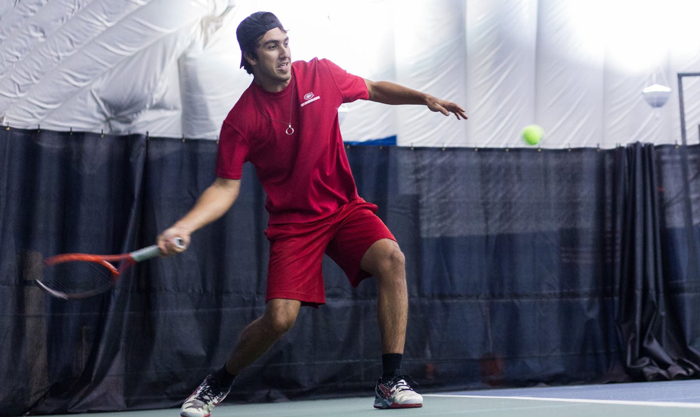 Freshman Odyr Cruz, from Brazil is transferring after his first season at Saint Cloud University to continue playing college Tennis.] Elizabeth Brumley special to the Star Tribune * St. Cloud State has decided to drop a number of sports programs including Tennis. The men's tennis team practice at Fitness Evolution in Sartell, MN.