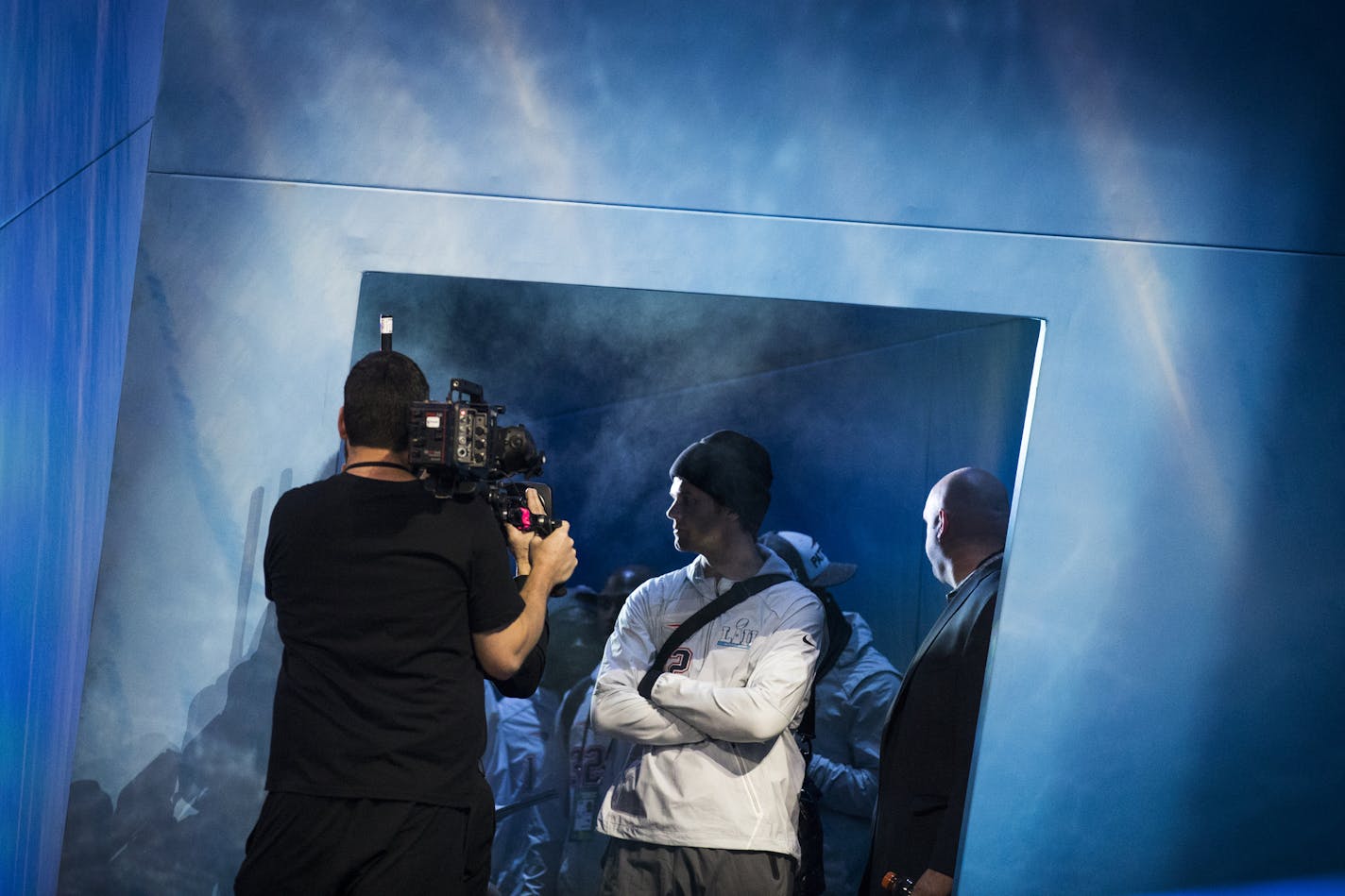 Tom Brady waits to walk out on stage for the introduction of the New England Patriots. ] LEILA NAVIDI &#xef; leila.navidi@startribune.com BACKGROUND INFORMATION: The New England Patriots and the Philadelphia Eagles attend Super Bowl Opening Night at Xcel Energy Center in St. Paul on Monday, January 29, 2018.