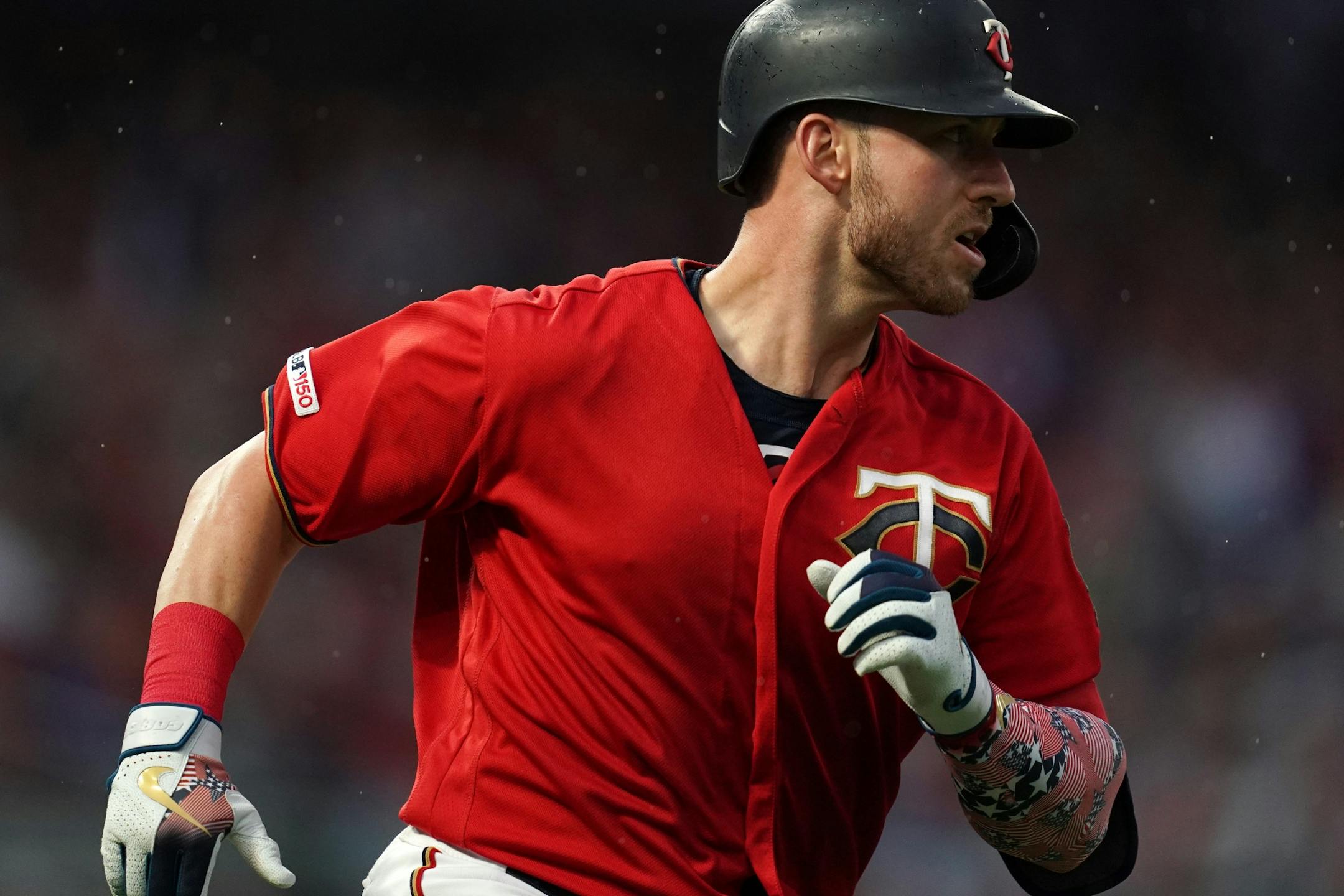 Minnesota Twins catcher Mitch Garver (18) ran down the first base line after hitting a double in the second inning.