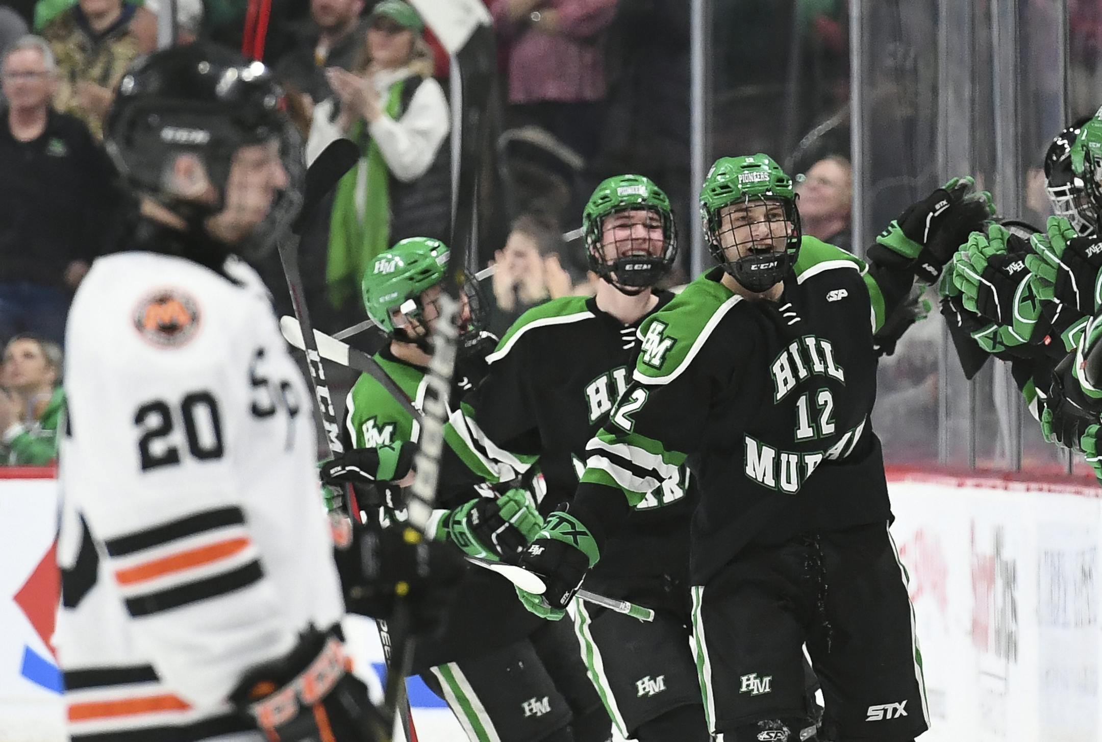 Hill-Murray forward Jared Jensen (12) celebrated a goal scored against goaltender Hudson Hodges (31) in the second period. ] Aaron Lavinsky • aaron.lavinsky@startribune.com Hill-Murray played Moorhead in a Class 2A state tournament quarterfinal game on Thursday, March 5, 2020 at the Xcel Energy Center in St. Paul, Minn.