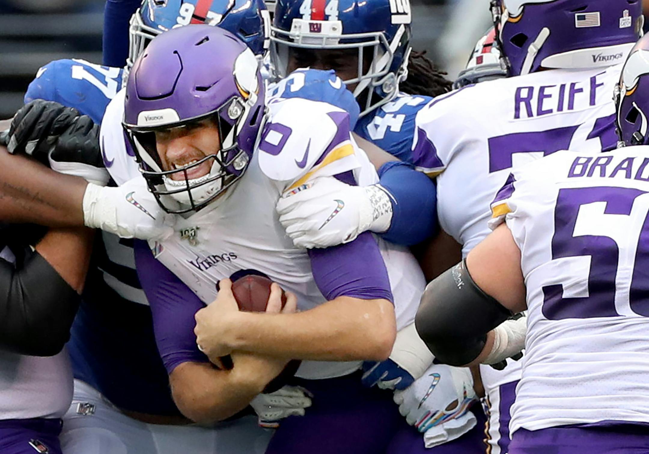 Minnesota Vikings quarterback Kirk Cousins (8) and center Garrett Bradbury (56). ] CARLOS GONZALEZ • cgonzalez@startribune.com – East Rutherford, NJ – October 6, 2019, MetLife Stadium, NFL, Minnesota Vikings vs. New York Giants