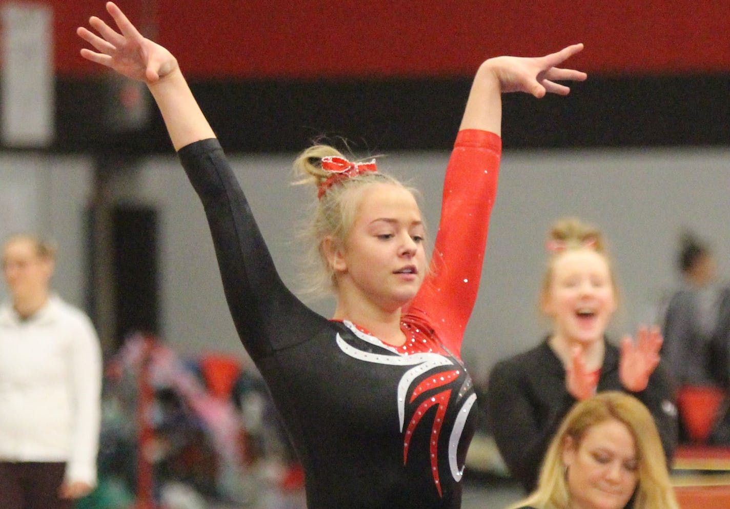 Stillwater gymnast Ida Bjoerklund, a senior foreign exchange student from Norway, after completing her floor exercise routine at the Section 4AA meet on Sat., Feb. 16, 2019