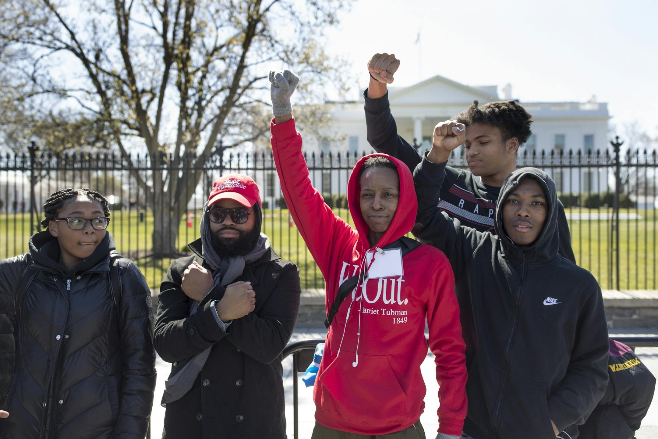 Ka'Jahna Lambert, left, Northside Achievement Zone's Kenneth Scales and Jaton White, Chris Jennings and Andre Broadnax posed in front of the White House on Friday, March 23, before the March for Our Lives rally.The students and their mentors toured Howard University and the new Smithsonian Museum to learn about African-American history, culture and the civil rights movement.