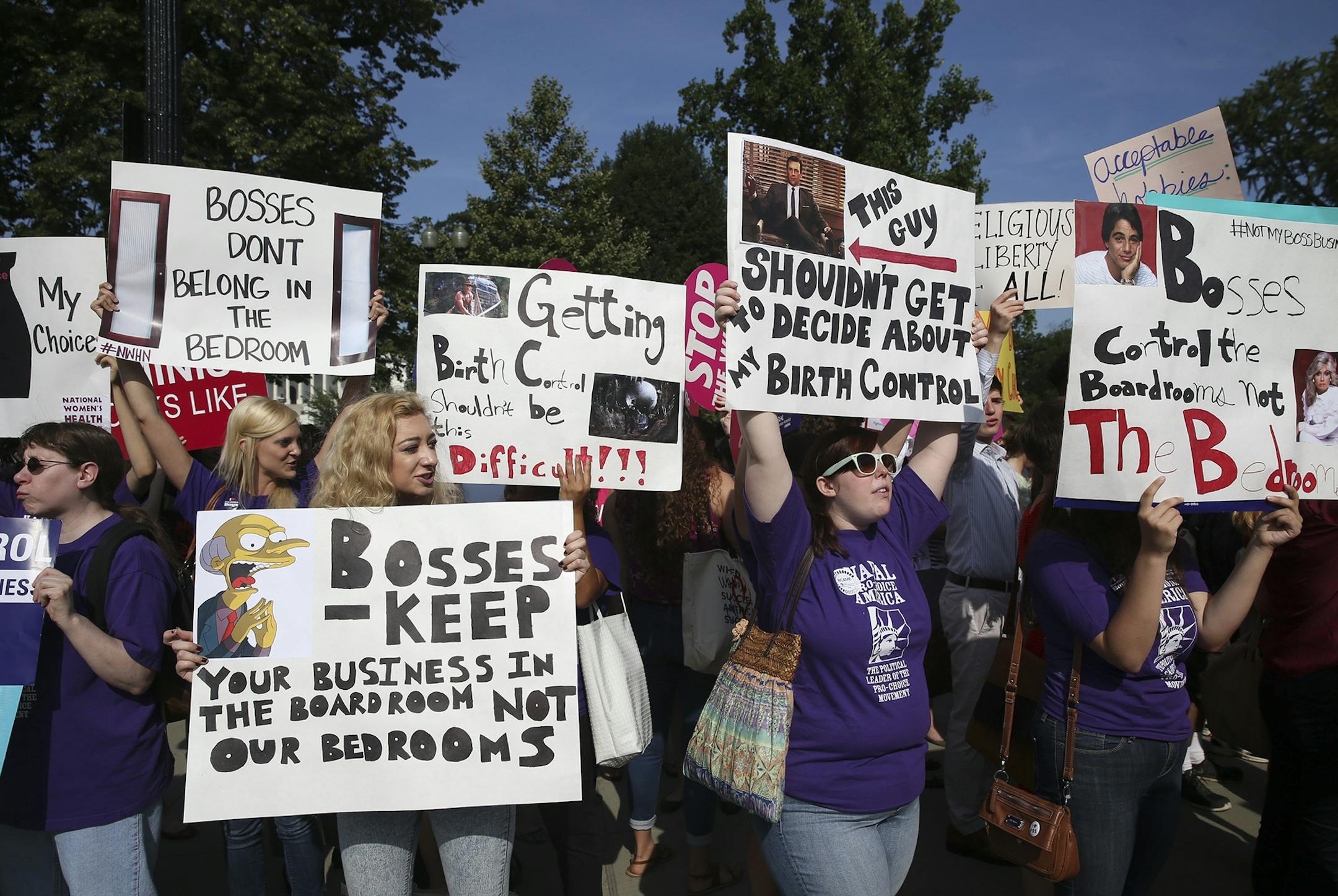 Activists react after the Supreme Court ruled on whether for-profit corporations may advance claims based on religious freedom, in Washington, June 30, 2014. The court ruled in a 5-to-4 decision on Monday that requiring family-owned corporations to pay for insurance coverage for contraception under the Affordable Care Act violated a federal law protecting religious freedom. (Doug Mills/The New York Times) ORG XMIT: MIN2014063014520840