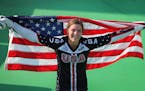 Alise Willoughby celebrates winning a silver medal in the women’s BMX at the 2016 Summer Olympics.