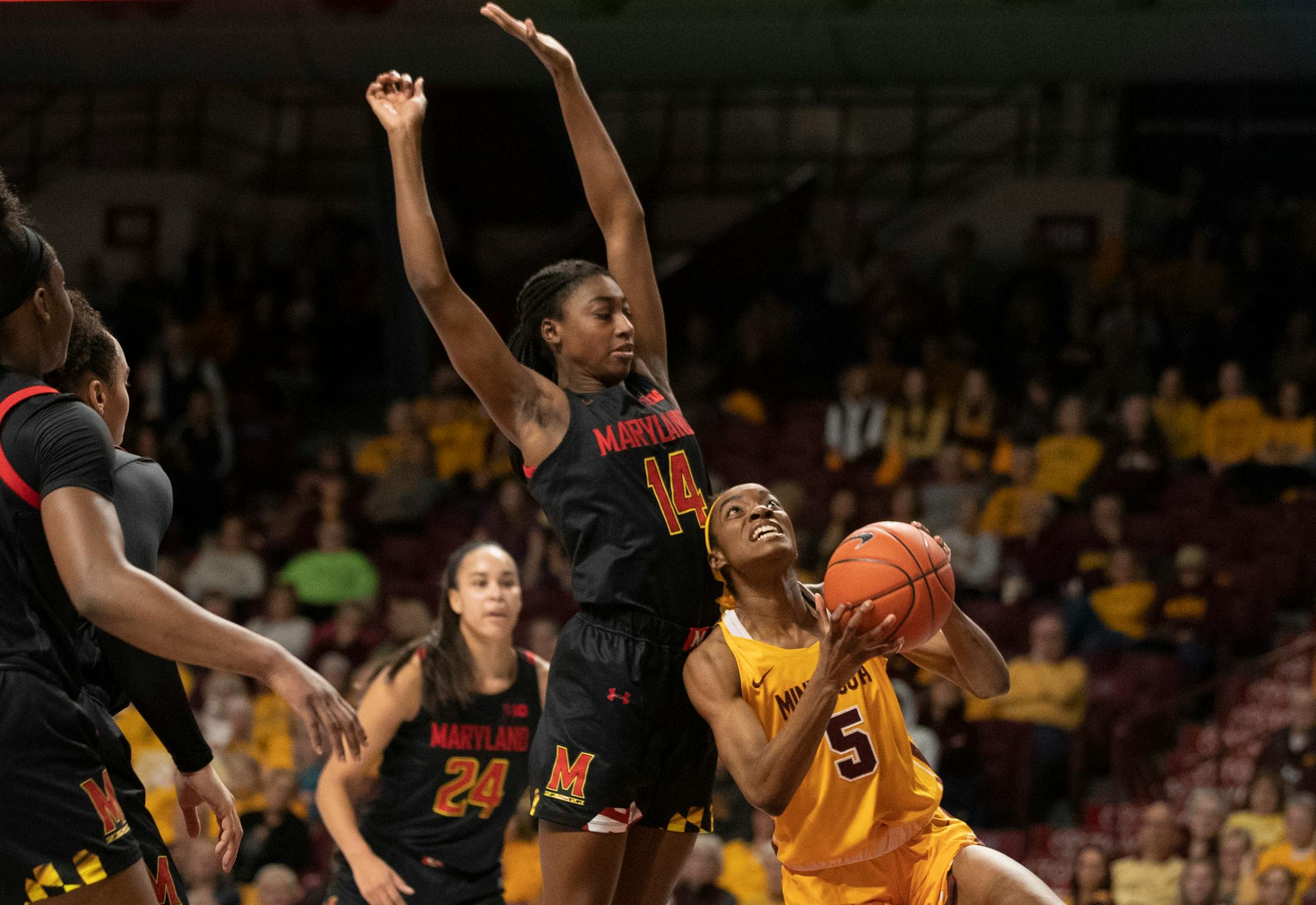 Gophers forward Taiye Bello (5) was named to the all-Big Ten second team in women's basketball.