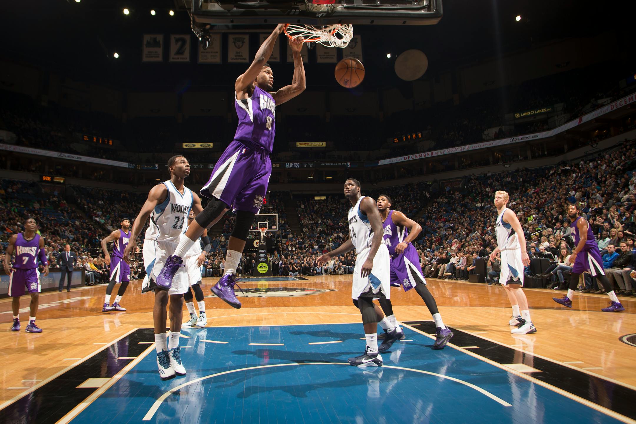 Sacramento Kings forward Rudy Gay (8) follows through with a dunk on the Timberwolves during the first half of Thursday night's game.