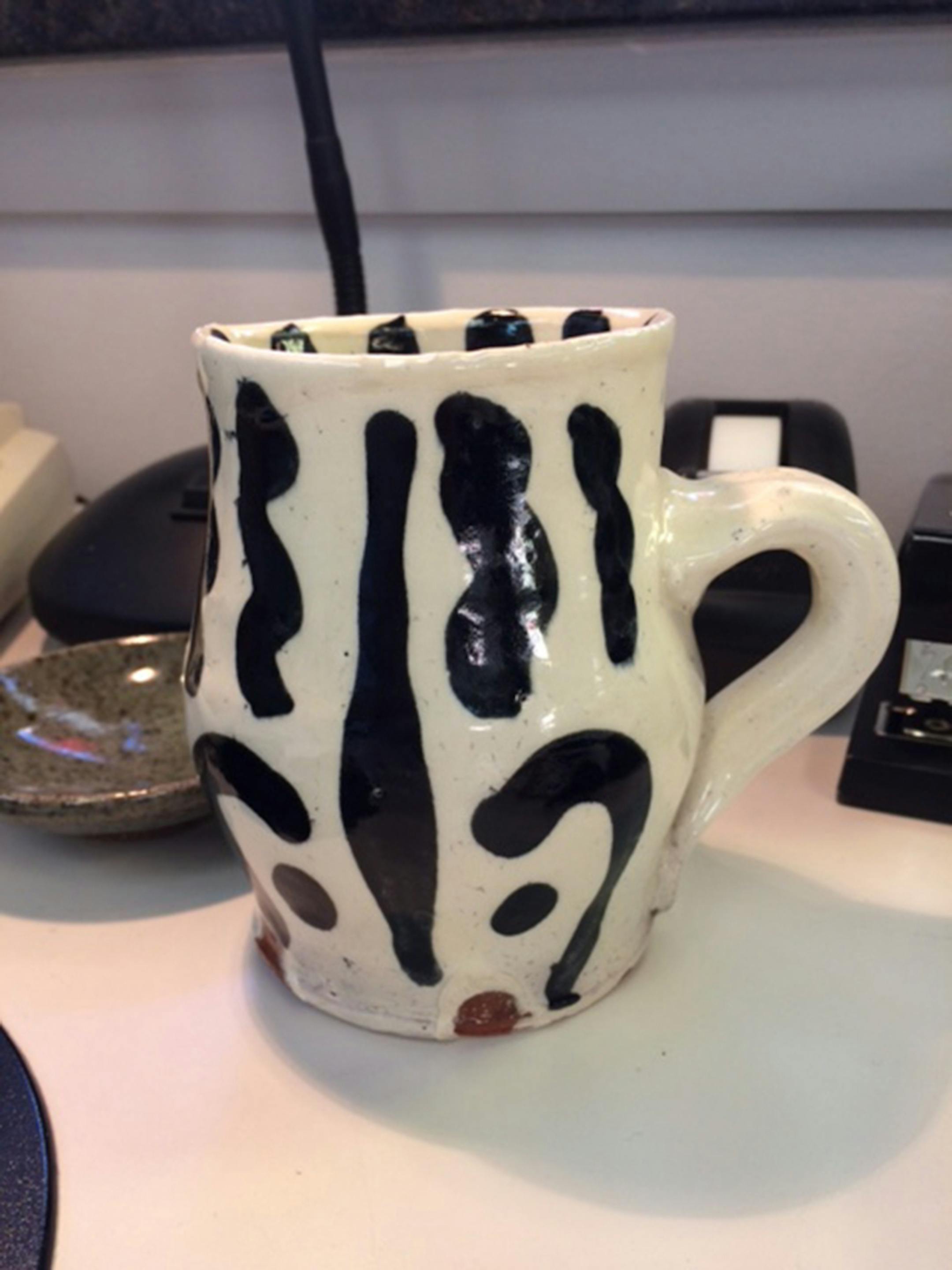 This is the current favorite work mug of Jennifer Tatsuda of Minneapolis. "I am surrounded by beautiful mugs at Northern Clay Center and have not been able to make my own (yet)."