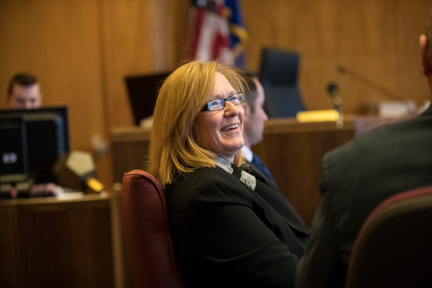 Lt. Gov. Michelle Fischbach chatted with one of her lawyers before a motion hearing in the civil lawsuit claiming she should give up her Senate seat after becoming Lieutenant Governor when former Lt. Gov. Sen. Tina Smith was appointed to the U.S. Senate. Photographed on Tuesday, February 6, 2018, at the Ramsey County Courthouse in St. Paul, Minn. ] RENEE JONES SCHNEIDER � renee.jones@startribune.com