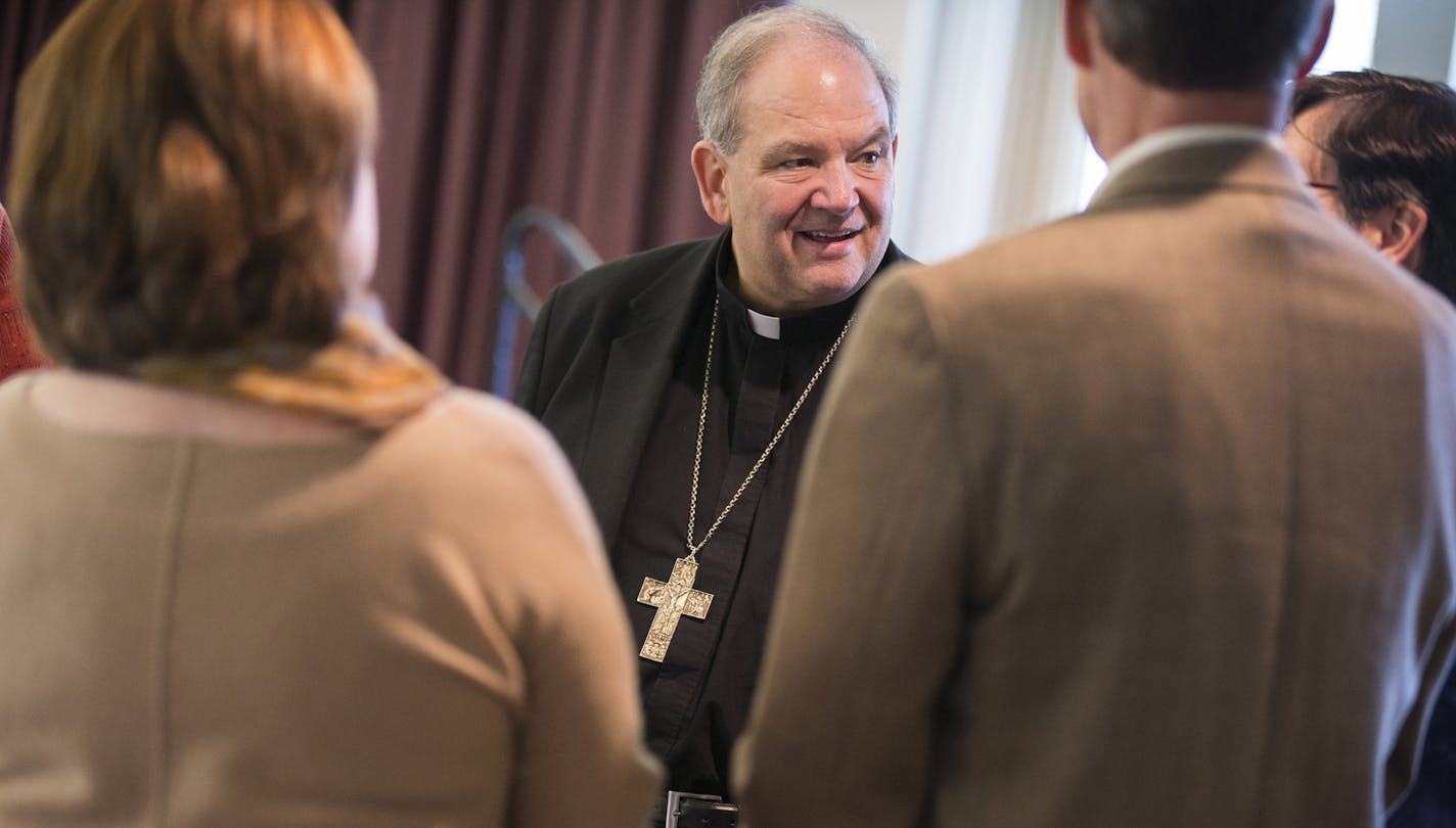 Interim Archbishop Bernard Hebda chats with people before a listening session with Twin Cities Catholics about what kind of person they would like to see take over as archbishop at St. Catherine University in St. Paul on Monday, October 5, 2015. ] LEILA NAVIDI leila.navidi@startribune.com /