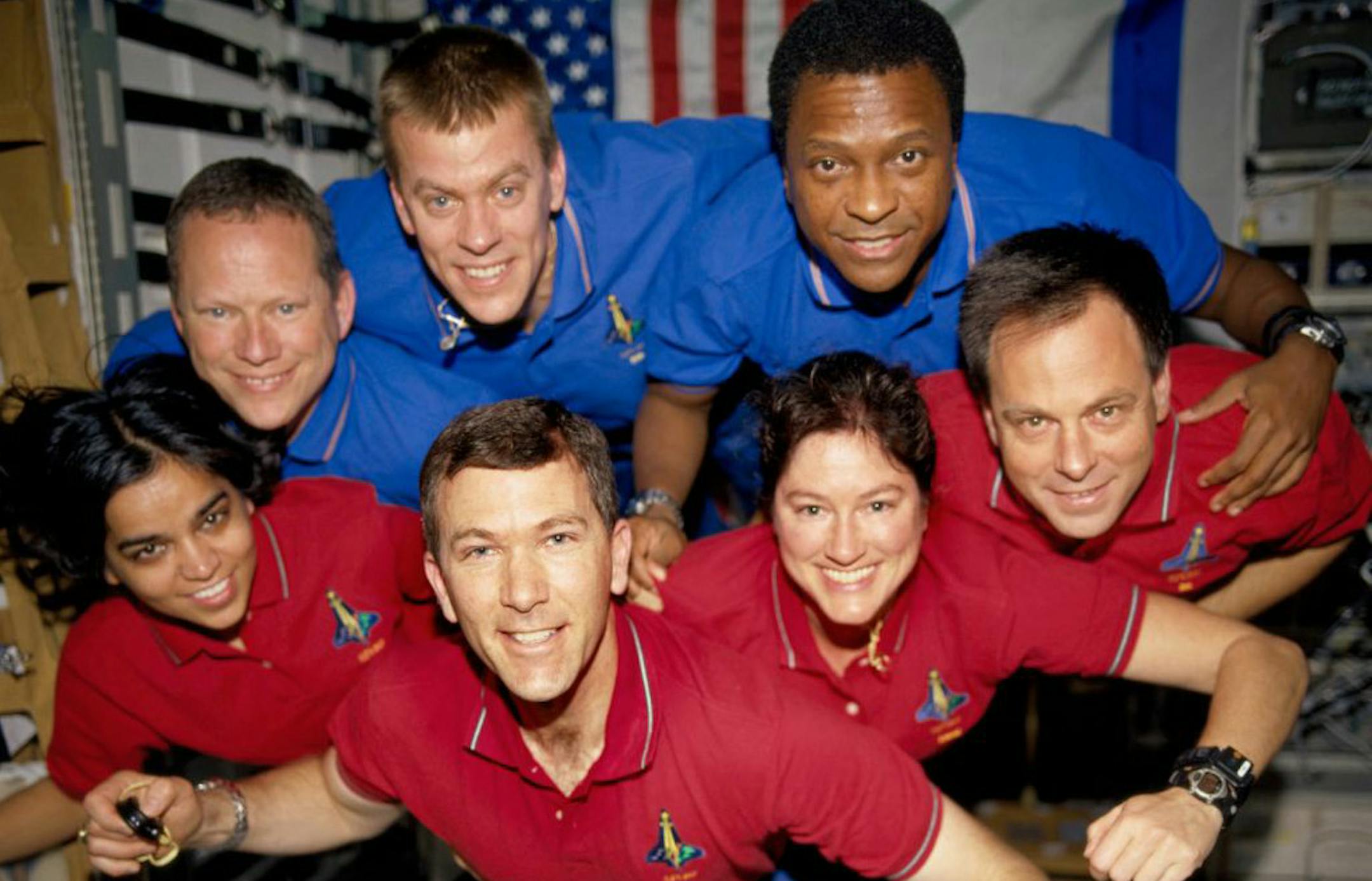 Columbia crew members,counterclockwise from bottom left, Kalpana Chawla, Rick Husband, Laurel Clark, Ilan Ramon, Michael P. Anderson, William McCool and David Brown.