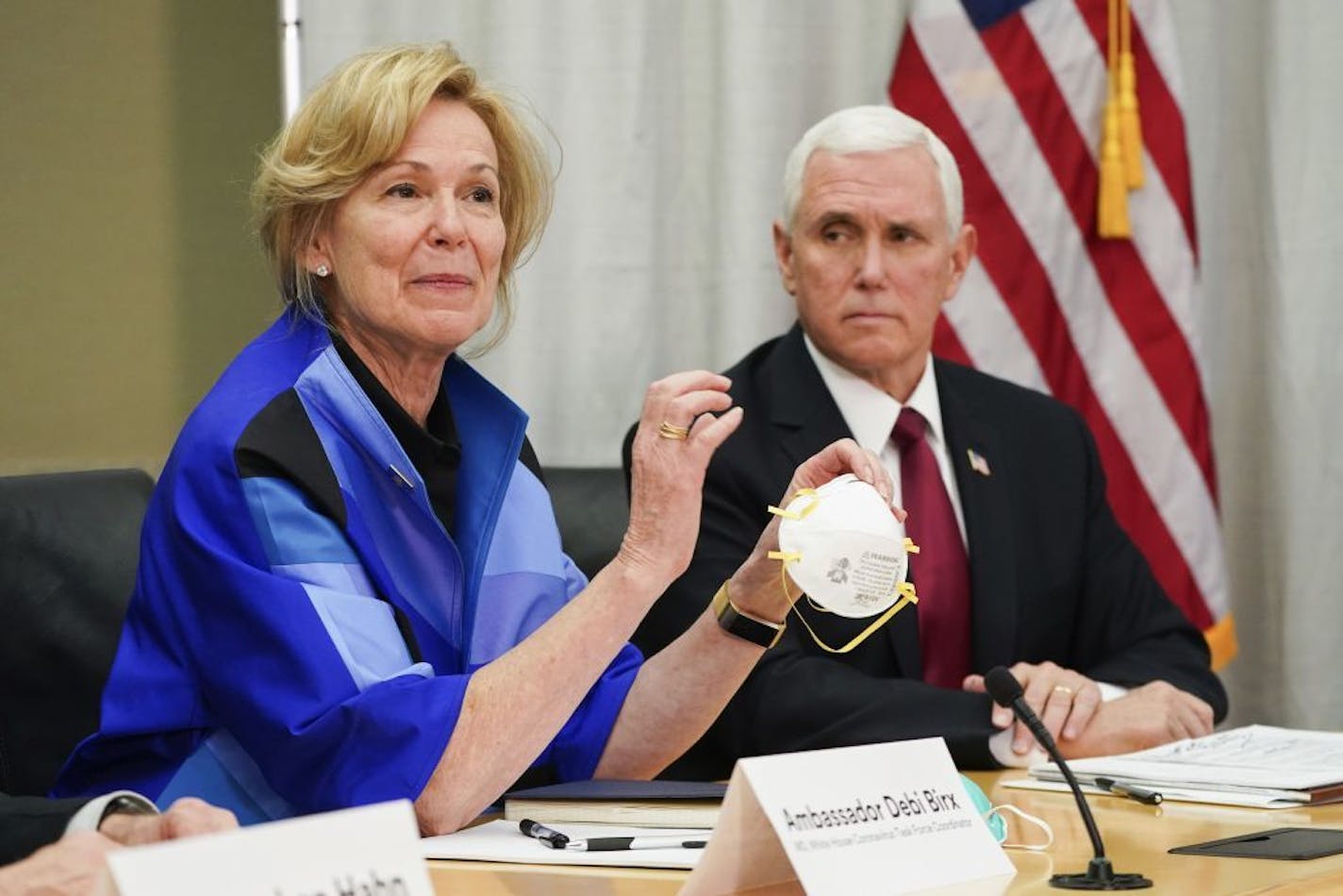 Dr. Deborah Birx, the White House's coronavirus response coordinator, held an N95 mask as she visited 3M headquarters in Maplewood in March with Vice President Mike Pence.