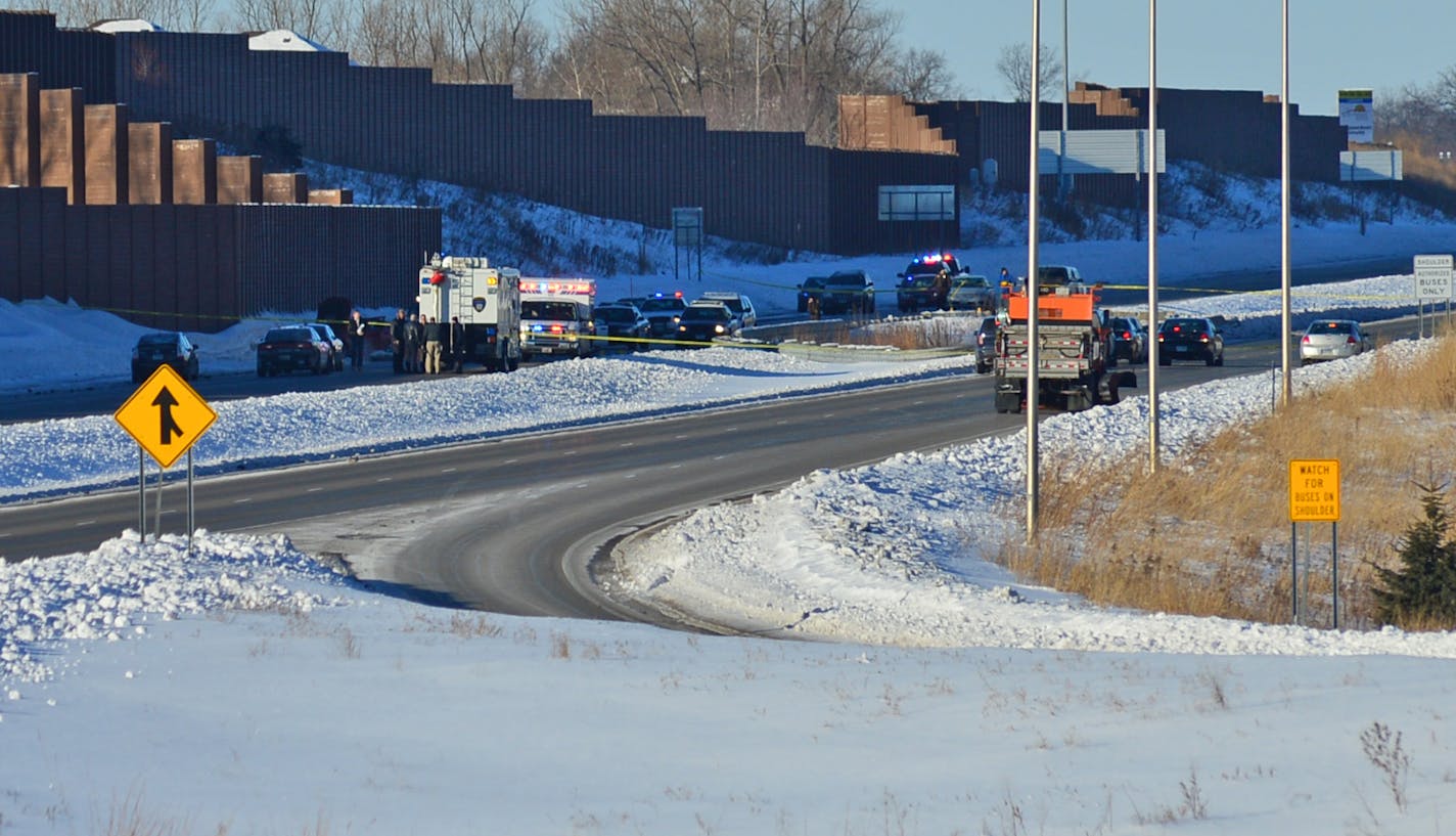 Police surrounded a vehicle on eastbound Hwy. 212 between Hwy. 101 and Dell Road in Eden Prairie on Feb. 7, 2014, after the driver led them on a high-speed chase from Hwy. 41. The family of Dawn Pfister, the woman shot and killed by police officers during the incident, filed a federal lawsuit Monday against the Chaska officer who shot her, accusing him of improperly using deadly force.