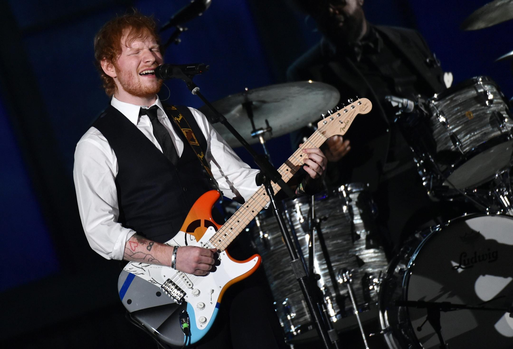 Ed Sheeran performs at the 57th annual Grammy Awards on Sunday, Feb. 8, 2015, in Los Angeles.