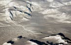 Glaciers seen during NASA's Operation IceBridge research flight to West Antarctica on Oct. 29, 2014. Illustrates CLIMATE (category a) by Chris Mooney 