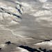 Glaciers seen during NASA's Operation IceBridge research flight to West Antarctica on Oct. 29, 2014. Illustrates CLIMATE (category a) by Chris Mooney 