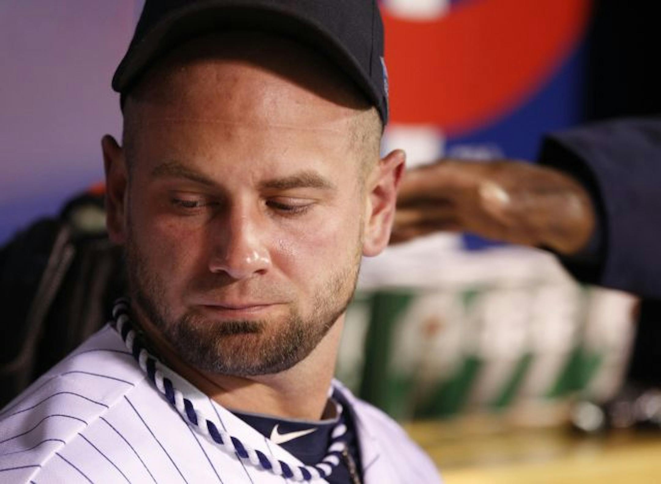 Twins pitcher Jesse Crain sits in the dug out after allowing a two-run home run in the 7th inning Wednesday night. Crain pitched just one inning and gave the lead to New York, 6-4.